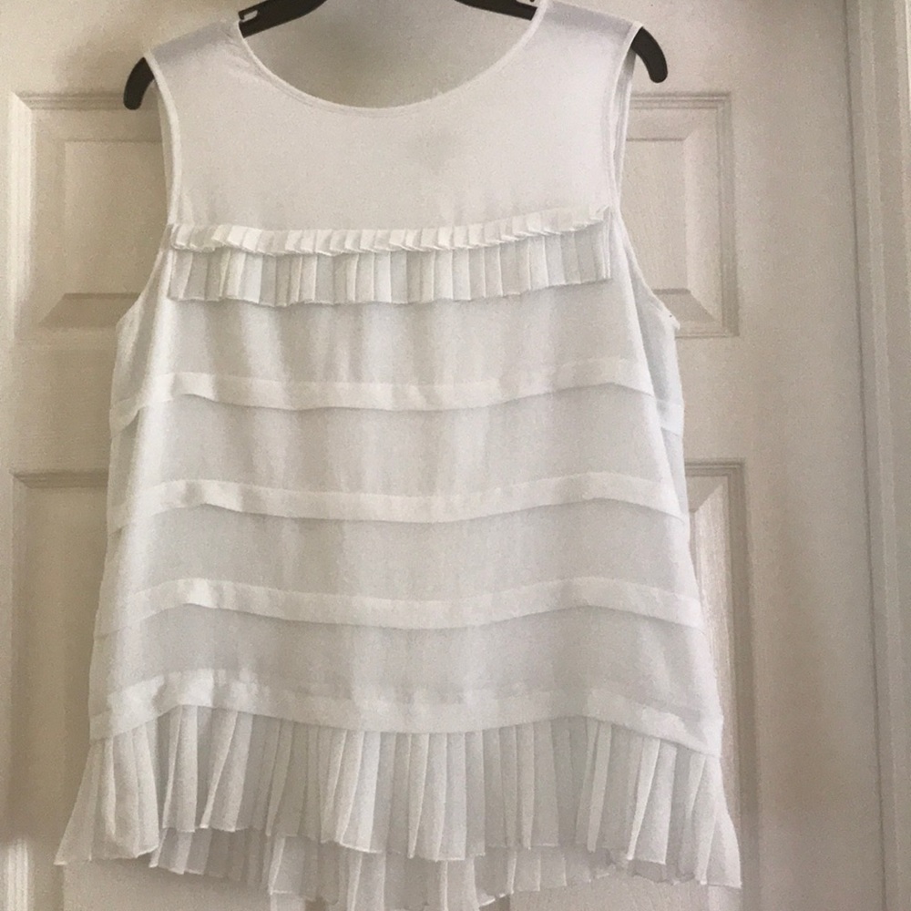 White Sleeveless top with ruffled front and back